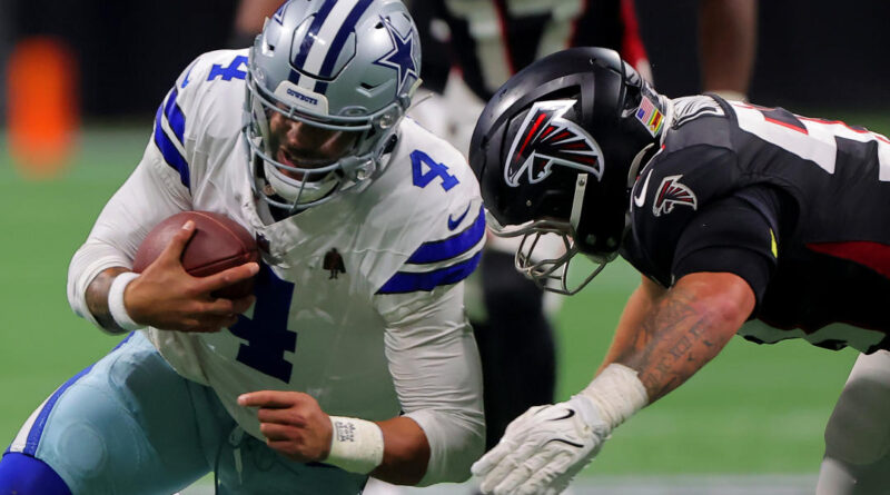 ATLANTA, GA - NOVEMBER 03: Dallas Cowboys quarterback Dak Prescott #4 is tackled during Sunday afternoon's NFL game between the Atlanta Falcons and the Dallas Cowboys on November 3, 2024 at Mercedes-Benz Stadium in Atlanta, Georgia. (Photo by David J. Griffin/Icon Sportswire via Getty Images)