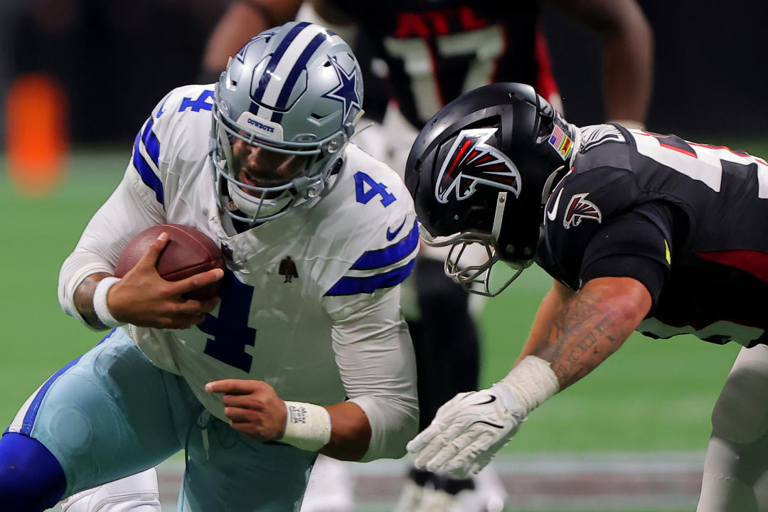 ATLANTA, GA - NOVEMBER 03: Dallas Cowboys quarterback Dak Prescott #4 is tackled during Sunday afternoon's NFL game between the Atlanta Falcons and the Dallas Cowboys on November 3, 2024 at Mercedes-Benz Stadium in Atlanta, Georgia. (Photo by David J. Griffin/Icon Sportswire via Getty Images)